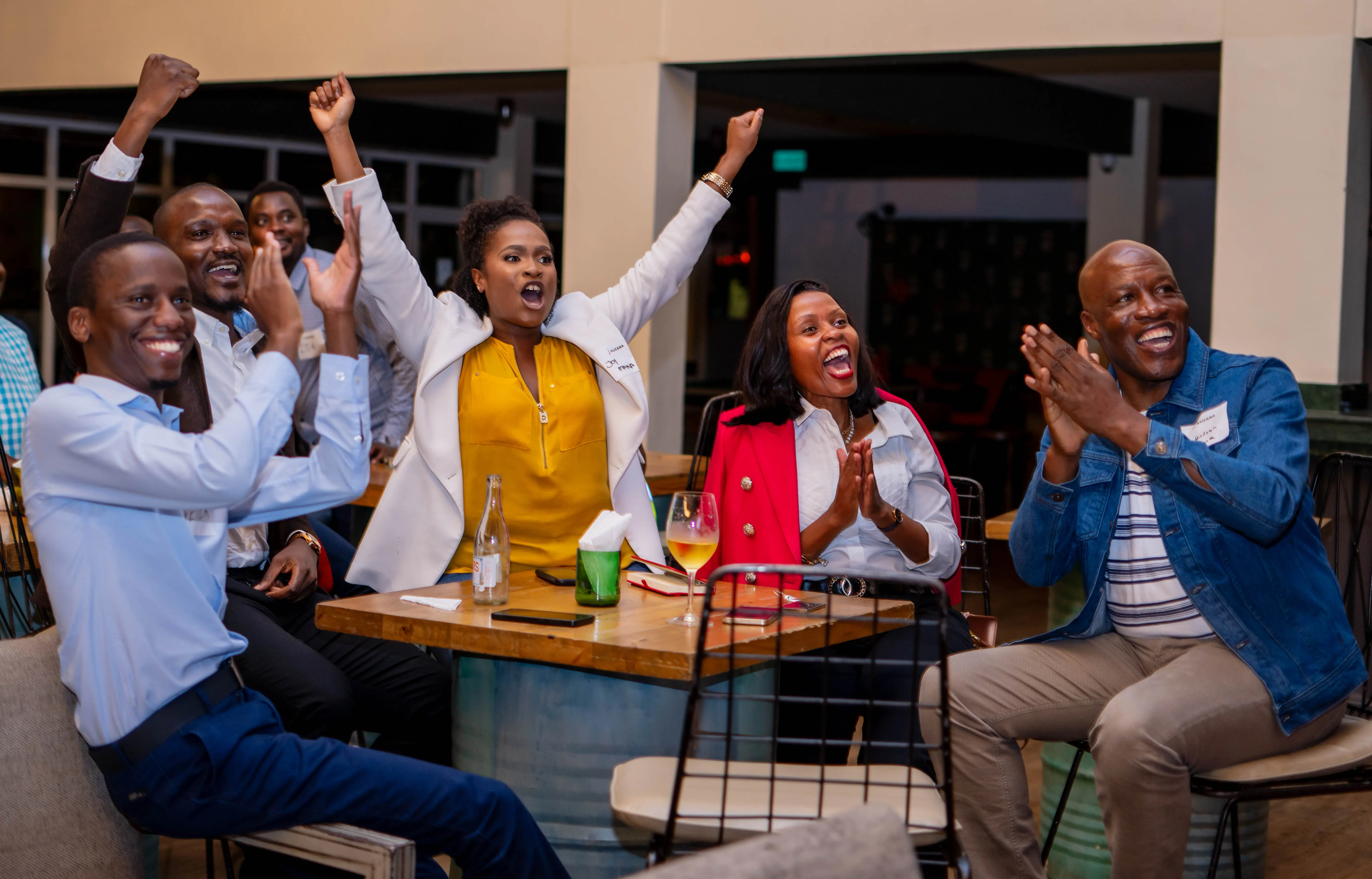 Audience celebrating at the event